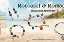 Rescued and Remade jewellery flat lay — three beaded bracelets and a pair of earrings made from a single upcycled necklace