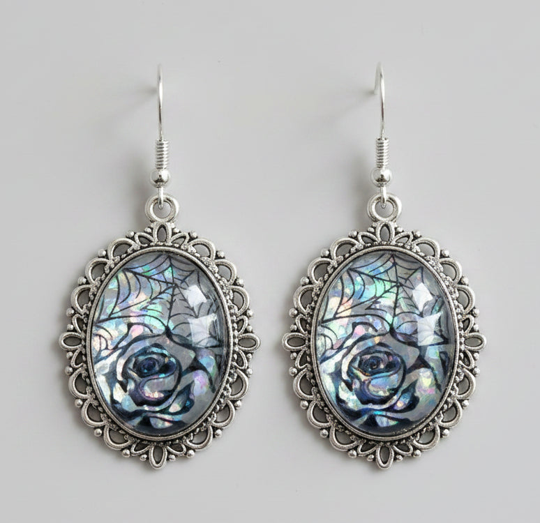 Iridescent Rose & Spiderweb Cabochon Drop Earrings — Antique Silver Filigree