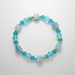 Teal & Ice Blue Crackle Bead Bracelet with Millefiori Accents