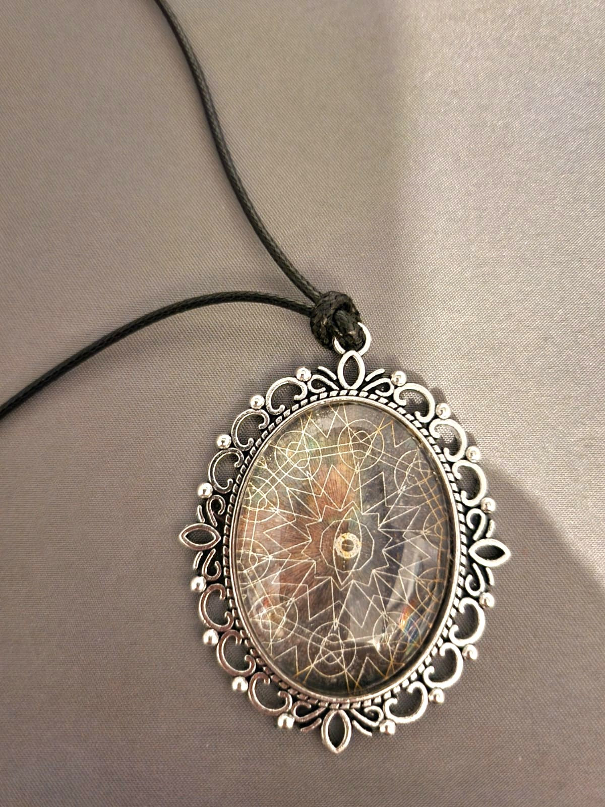 Geometric Oval Pendant on Black Cord