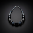 Shades of Black Grey & Silver Rescued Necklace dark moody background