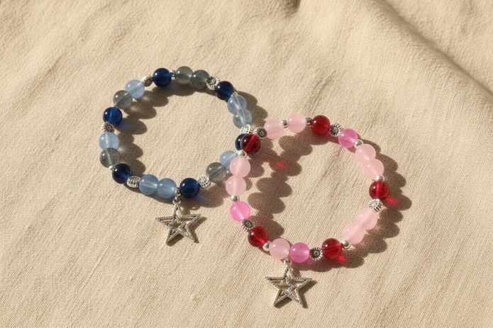 Blue and Pink Star Bracelets Flat Lay - Linen
