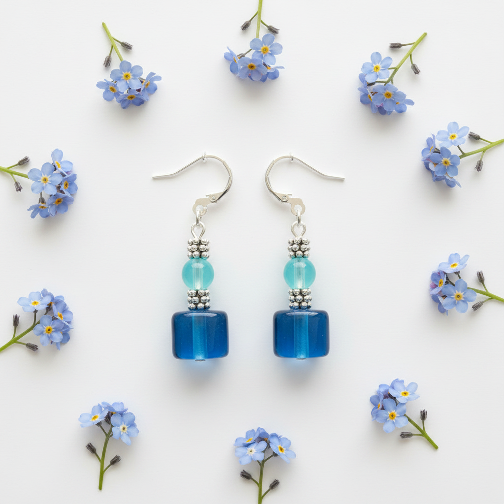 Flat lay with blue flowers