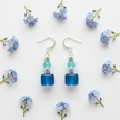 Flat lay with blue flowers