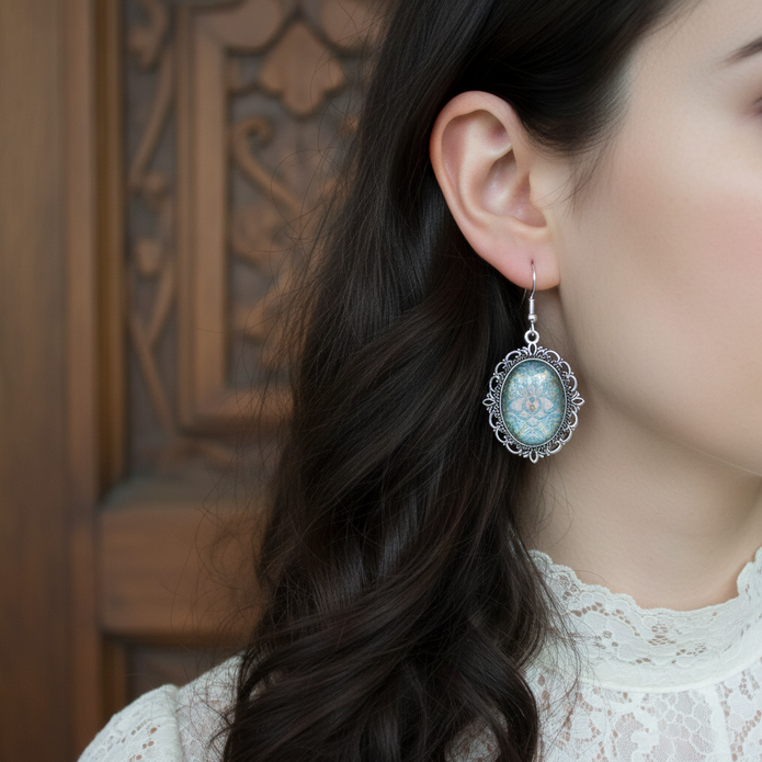 Iridescent blue holographic cabochon drop earrings worn lifestyle shot