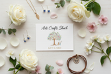 Arts Crafts Shack gift card displayed alongside handmade jewellery pieces and white roses