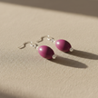 Purple plum pearl drop earrings - close up