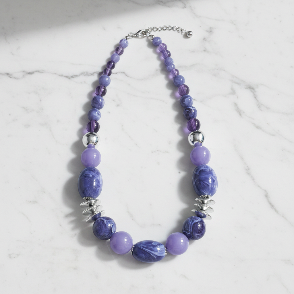Shades of Purple & Silver Rescued Necklace on marble surface