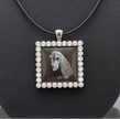 Beautiful dog artwork in a pendant necklace with black cord