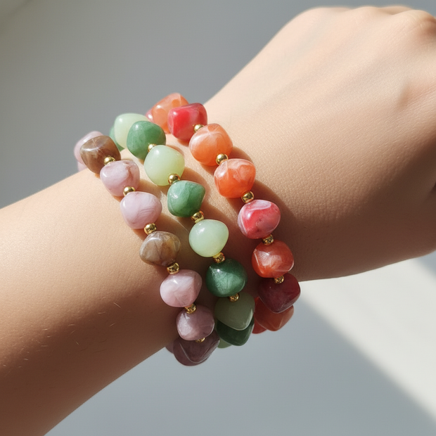 Three stacked bracelets on wrist