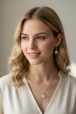 White daisy necklace and earrings on model